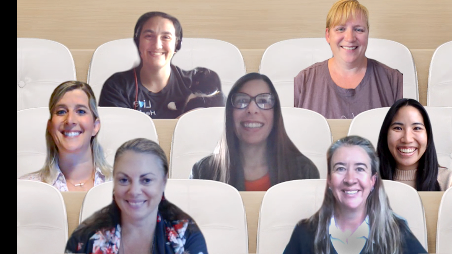 Seven women smiling in team photograph