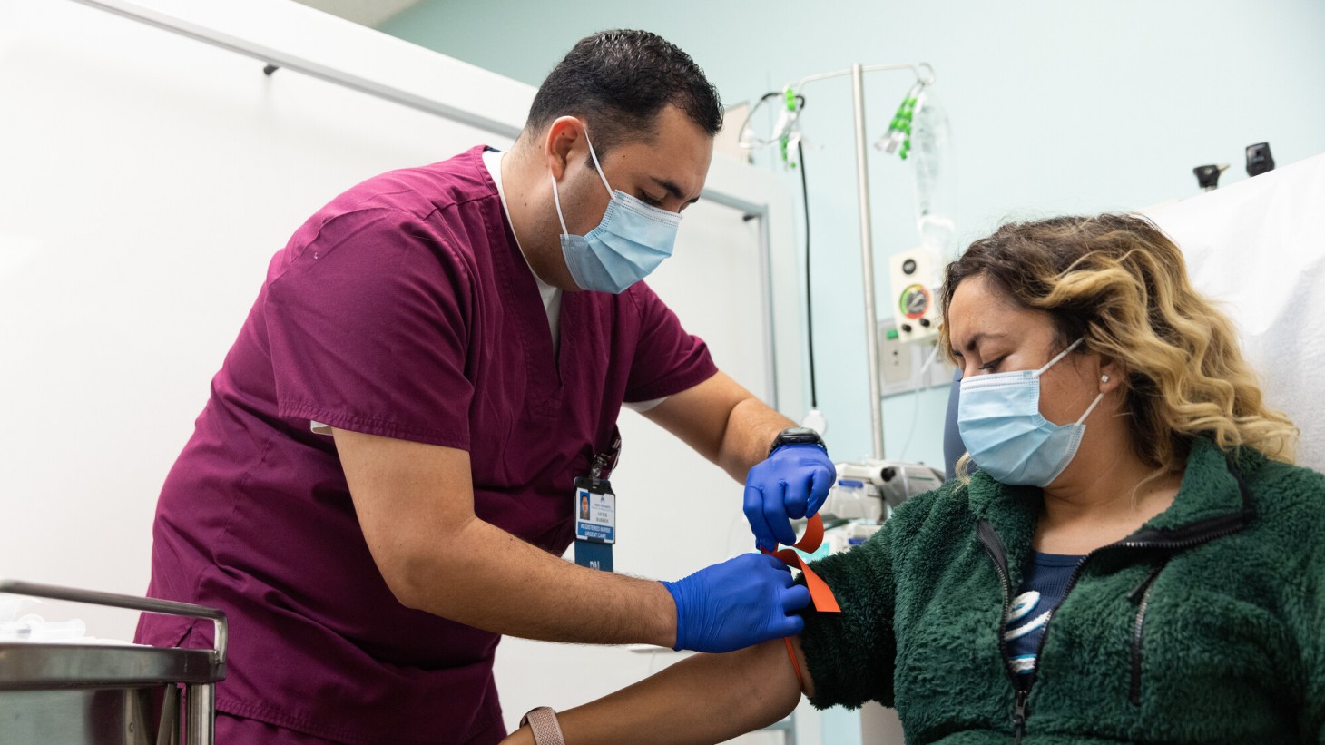 nurse helping patient