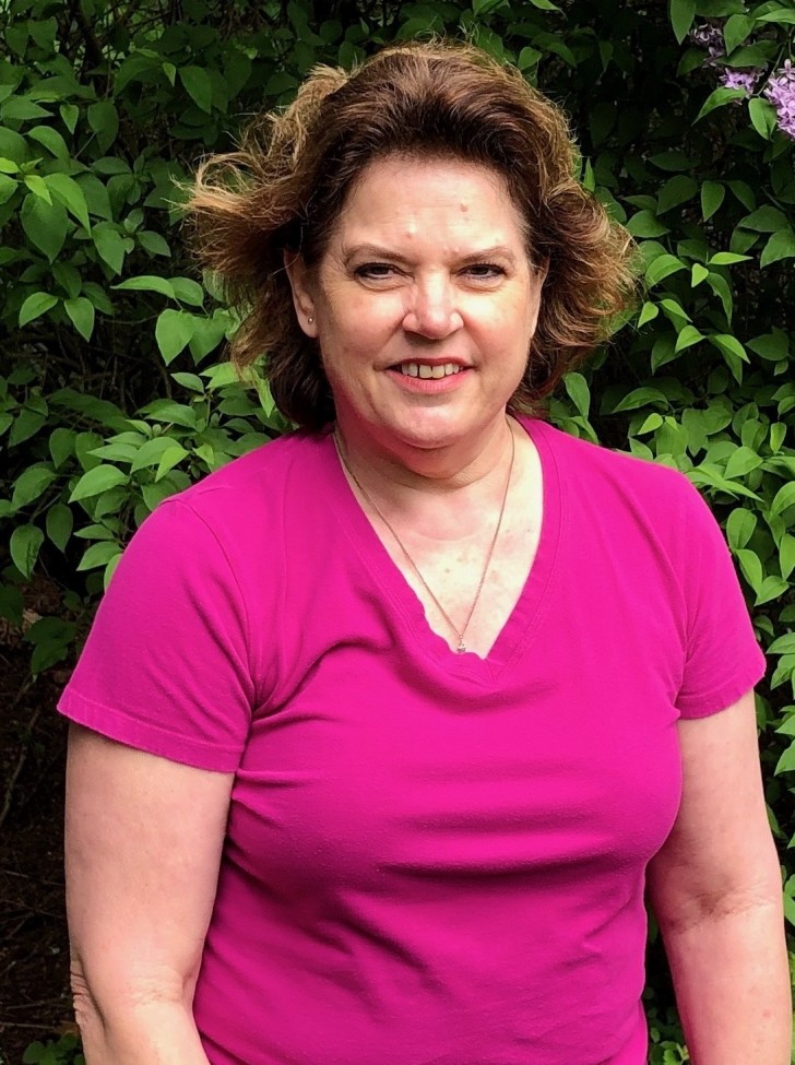 Woman wearing bright pink t-shirt 