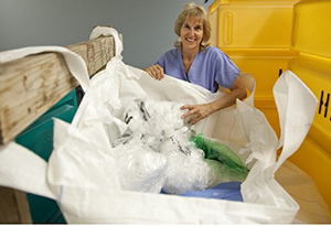 medical worker standing near waste area