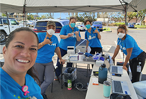 Lahaina team outside blue t-shirts