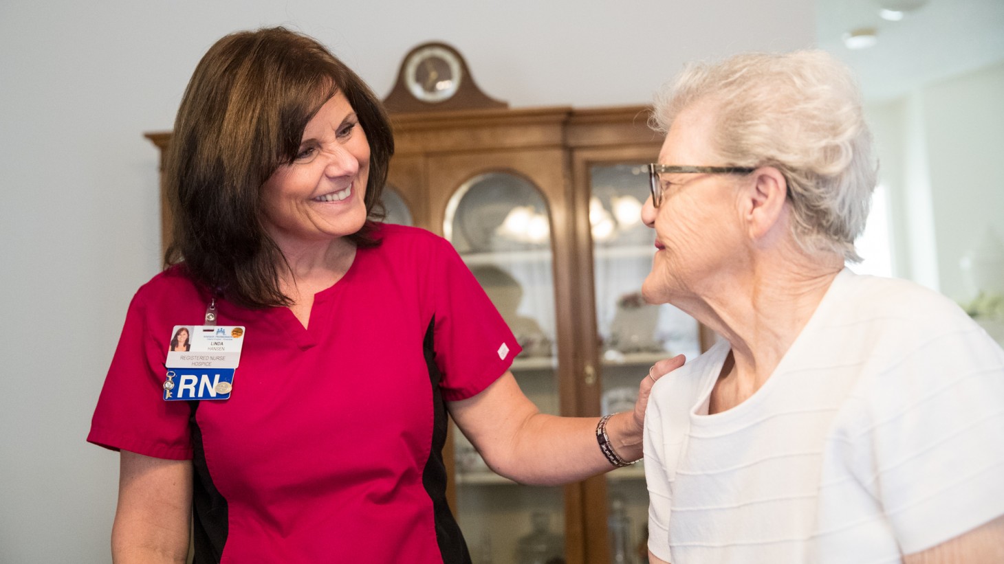 Linda Hansen, a nurse, standing with her patient, Madeline Lanell Haxton